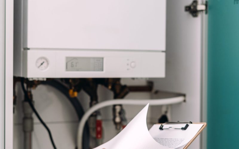 Cropped,Shot,Of,A,Repairman,Is,Inspecting,A,Gas,Boiler